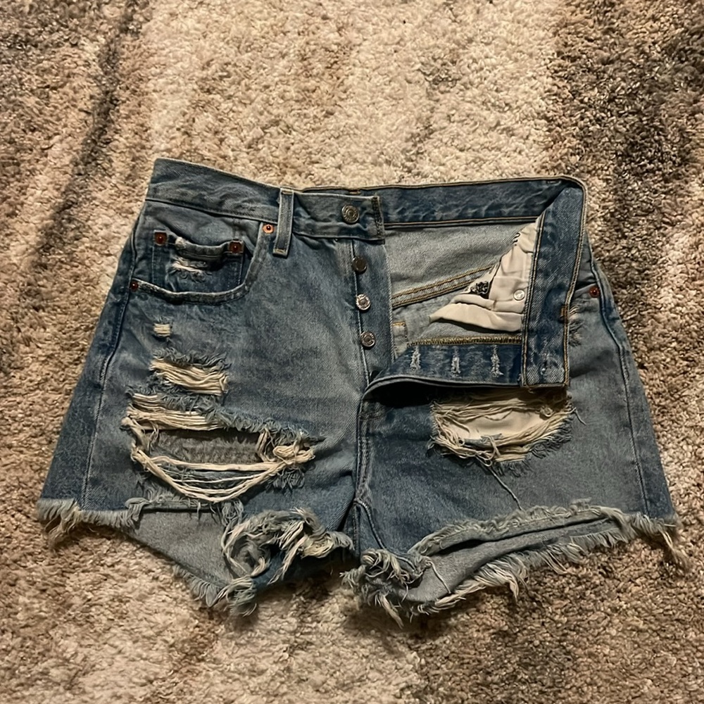 Distressed denim shorts